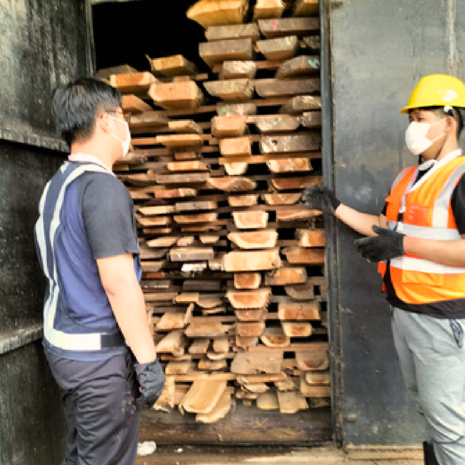 Kiln drying process showing stacked wood
